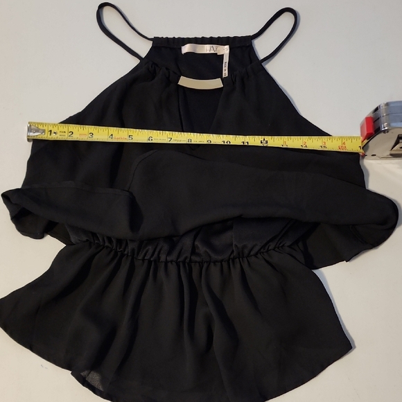 Black Asymmetrical Tiered Camisole With Gold Piece In Front - Picture 3 of 5